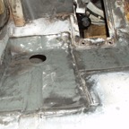 Driver's side front floor welded in patches.jpg